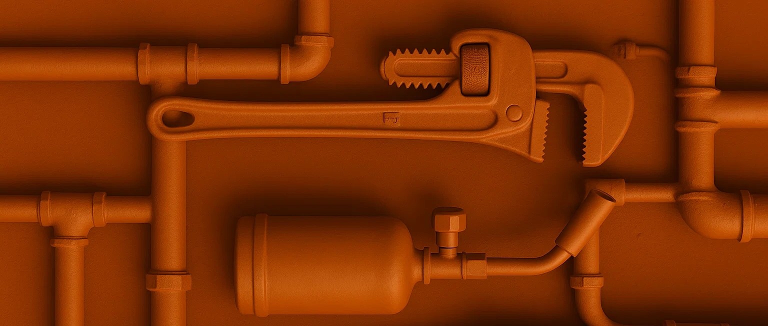 Fondo naranja con tuberías que representan fontanería y calefacción Valencia